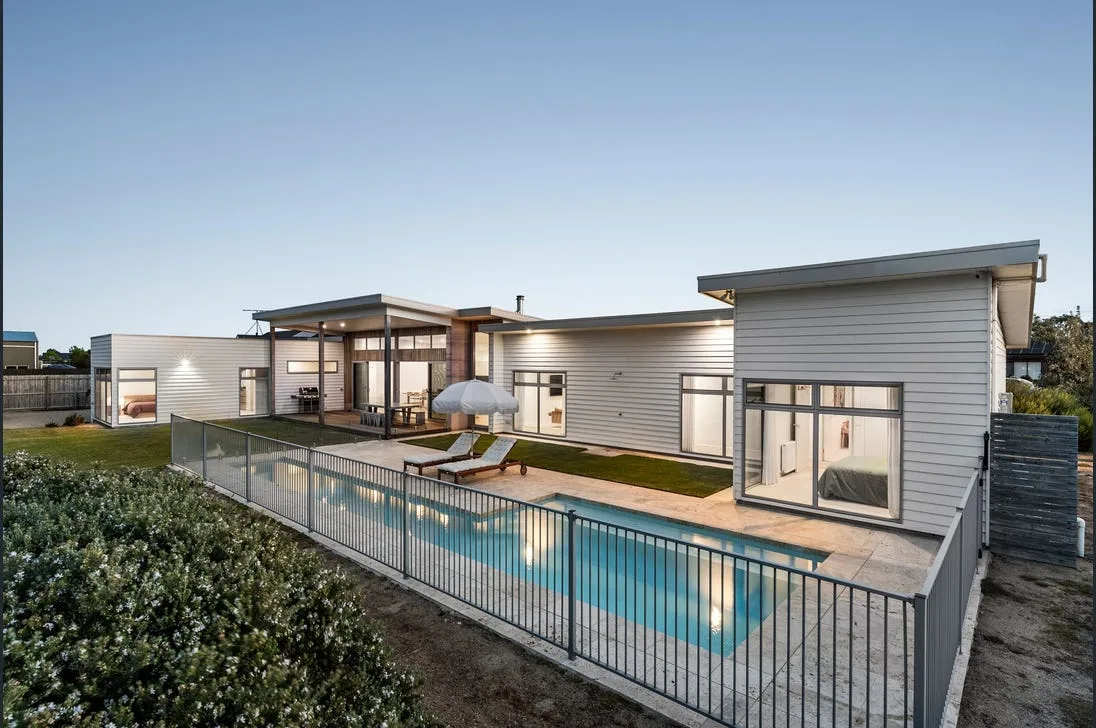Aluminium-style pool fencing around a modern Townsville home
