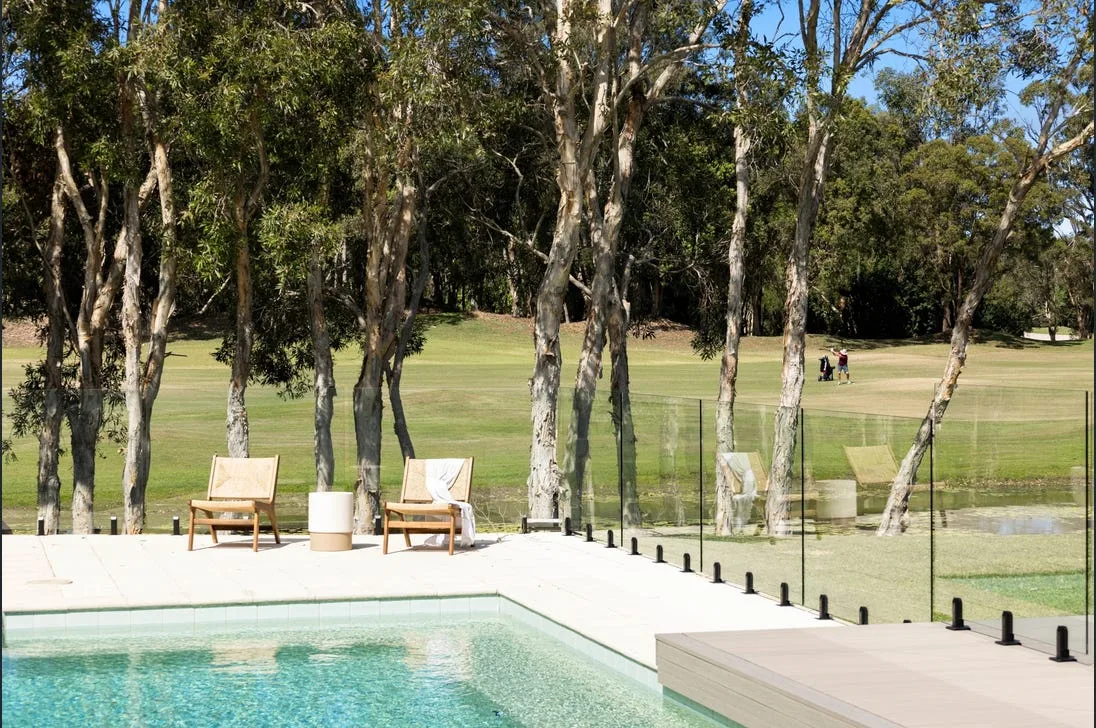 Frameless glass pool fencing on a Vincent property