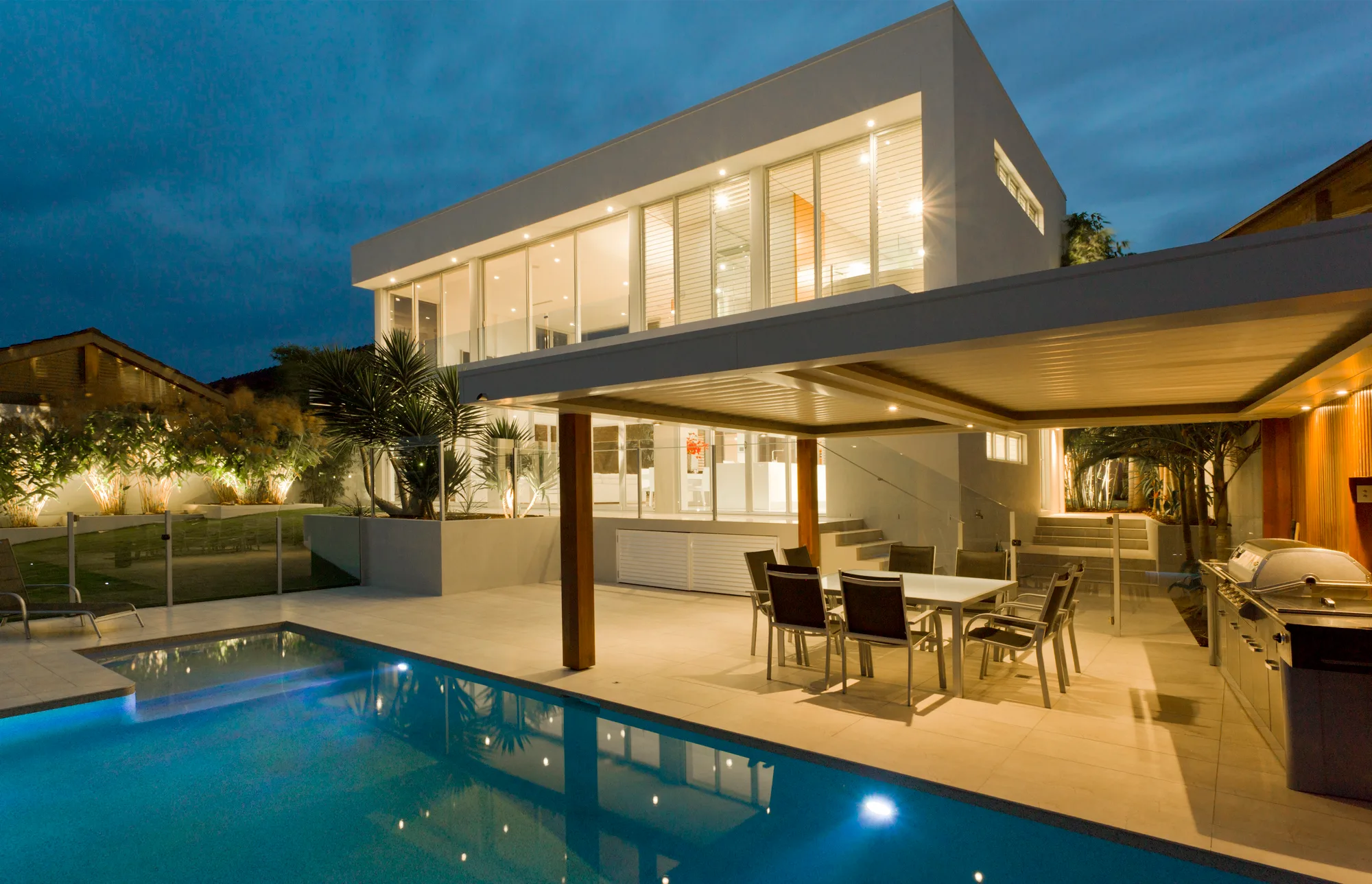 Glass pool fencing on a new-build Idalia backyard